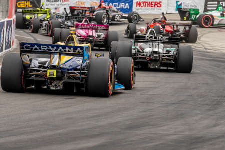 JIMMIE JOHNSON (R) (48) of the United States races through the turns during the race for the Acura...