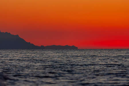 The sun rises on the Pacific Ocean in Baja California