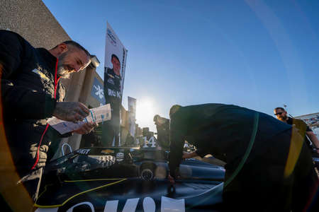 Crew members of AJFoyt Racing prepare their race car before a practice for the XPEL 375 in Ft....