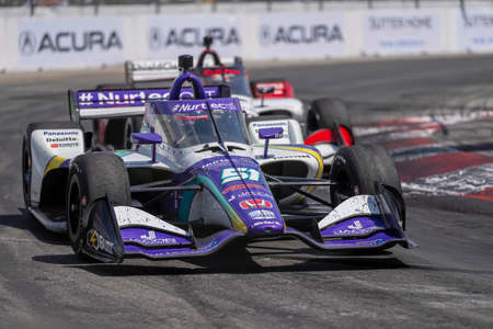 TAKUMA SATO (51) of Tokyo, Japan races through the turns during the Acura Grand Prix of Long Beach at The Streets of Long Beach in Long Beach California.のeditorial素材
