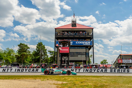 DALTON KELLETT (4) of Stouffville, Canada takes the checkered flag for the Honda Indy 200 at the Mid Ohio Sports Car Course in Lexington OH.のeditorial素材