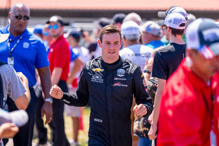 KYLE KIRKWOOD (14) (R) of Jupiter, Florida is introduced to the fans before racing for the Honda Indy 200 at the Mid Ohio Sports Car Course in Lexington, OH, USA.のeditorial素材