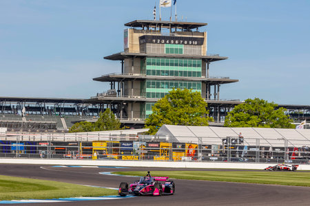 HELIO CASTRONEVES (06) of Sao Paulo, Brazil travels through the turns during a practice for the Gallagher Grand Prix at the Indianapolis Motor Speedway in Indianapolis IN.のeditorial素材