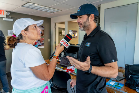 JIMMIE JOHNSON (48) of El Cajon, California  takes questions from the media before the Bommarito Automotive Group 500 at the World Wide Technology Raceway At Gateway in Madison, IL, USA.のeditorial素材