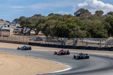 KYLE KIRKWOOD (14) (R) of Jupiter, Florida races through the turns during the Firestone Grand Prix of Monterey at the WeatherTech Raceway Laguna Seca in Monterey CA.のeditorial素材