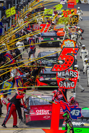 BRISTOL, TN - MAR 20, 2011:  Tony Stewart (14) brings his Office Depot Chevrolet down pit road during the running of the Jeff Byrd 500 race at the Bristol Motor Speedway in Bristol, TN.のeditorial素材