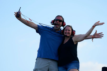 Fans cheer for their favorite drivers during the Daytona 500 at Daytona International Speedway in Daytona Beach, FL.のeditorial素材