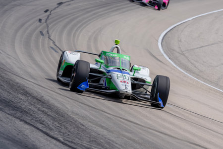 STING RAY ROBB (51) (R) of Payette, Idaho races through the turns during the PPG 375 at the Texas Motor Speedway in Ft Worth TX.のeditorial素材