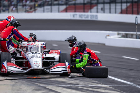 JACK HARVEY (30) of Bassingham, England brings his car in for service during the GMR Grand Prix at Indianapolis Motor Speedway in Indianapolis IN.のeditorial素材