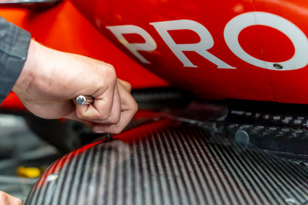 Crew members of AJFoyt Racing prepare their race car for the Indianapols 500 in Indianapolis, IN, USA.のeditorial素材