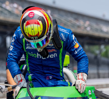 INDYCAR driver, STING RAY ROBB (R) (51) of Payette, Idaho, straps into his Dayle Coyne Racing with Rick Ware Honda to practice for the Indianapols 500 at Indianapolis Motor Speedway in Indianapolis, IN, USA.のeditorial素材