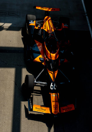 The Arrow McLaren Chevrolet crew roll out their race car to pit road before a practice for the Indianapolis 500 at the Indianapolis Motor Speedway in Indianapolis IN, USA.のeditorial素材