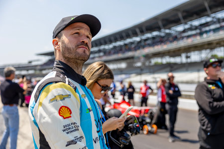 INDYCAR driver, AGUSTIN HUGO CANAPINO (R) (78) of Arrecifes, Argentina and his Juncos Hollinger Racing Chevrolet team, prepare to qualify for the Indianapolis 500 at the Indianapolis Motor Speedway in Indianapolis, IN, USA.のeditorial素材