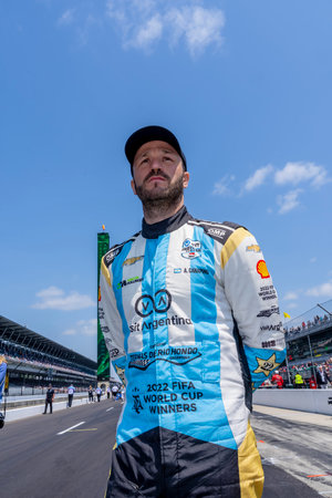 INDYCAR driver, AGUSTIN HUGO CANAPINO (R) (78) of Arrecifes, Argentina and his Juncos Hollinger Racing Chevrolet team, prepare to qualify for the Indianapolis 500 at the Indianapolis Motor Speedway in Indianapolis, IN, USA.のeditorial素材