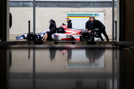 The crew of AJ Foyt racing prepares their race car prior to a practice for the Indianapolis 500 at...