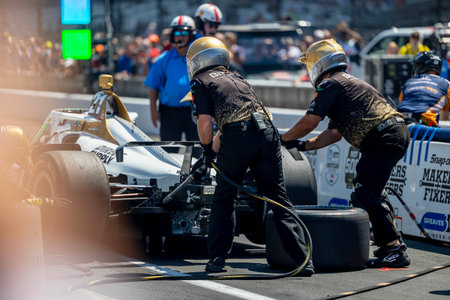 INDYCAR driver, RINUS VEEKAY (21) of Hoofddorp, Netherlands, brings his Ed Carpenter Racing...