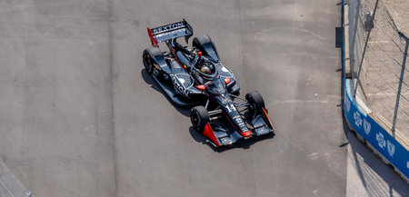INDYCAR driver, SANTINO FERRUCCI (14) of Woodbury, Connecticut, travels through the turns in his AJ...