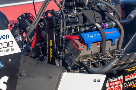 NHRA driver, Clay Millican, prepares to qualify for the Dodge Power Brokers NHRA Mile-High Nationals...