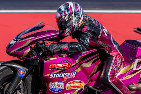 NHRA driver, Angie Smith, prepares to qualify for the Dodge Power Brokers NHRA Mile-High Nationals...