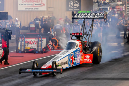 NHRA driver, Antron Brown, prepares to qualify for the Dodge Power Brokers NHRA Mile-High Nationals in Morrison, CO, USA.のeditorial素材