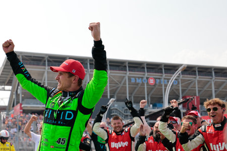 CHRISTIAN LUNGAARD (45) of Hedensted, Denmark celebrates in victory lane after winning the Honda Indy Toronto in Toronto, ON, CAN.のeditorial素材