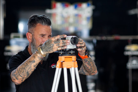 The crew of AJ Foyt Racing  works on the car prior to a practice session for the Honda Indy 200 at Mid-Ohio at Mid-Ohio Sports Car Course in Lexington OH.のeditorial素材