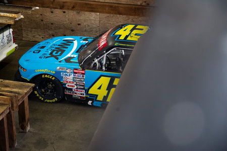 The crew of Niece Motorsports work on the truck prior to the O'Reilly Auto Parts 150 at Mid-Ohio at...