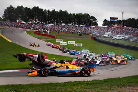 MARCUS ERICSSON (8) of Kumla, Sweden collides with FELIX ROSENQVIST (6) of Varnamo, Sweden at the...