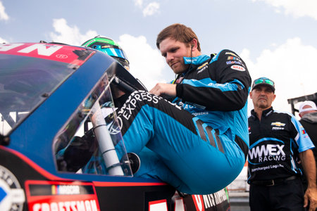 Conor Daly suits up before practice for the O'Reilly Auto Parts 150 at Mid-Ohio at Mid-Ohio Sports...