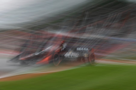 SANTINO FERRUCCI (14) of Woodbury, Connecticut drives on track during a practice for the Honda Indy...