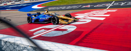 INDYCAR Driver, RYAN HUNTER-REAY (20) of Ft. Lauderdale, Florida, crosses the finish line at the end of the Hy-Vee INDYCAR Race Weekend race at the Iowa Speedway in Newton IA.のeditorial素材