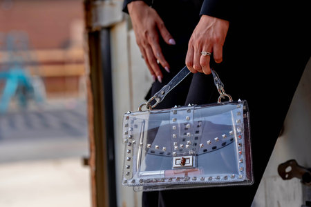A gorgeous blonde model poses outdoors while enjoying the summer weatherの写真素材