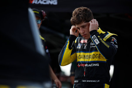 NASCAR Craftsman Truck Series Driver, NICHOLAS SANCHEZ gets ready to qualify for the Worldwide Express 250 at the Richmond Raceway in Richmond VA.のeditorial素材