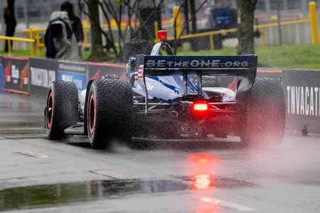 INDYCAR Series driver, ALEX PALOU (10) of Barcelona, Spain, travels through the turns during a wet...