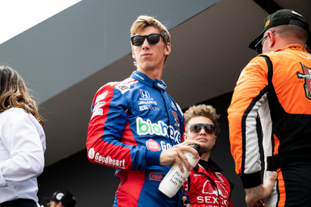 STING RAY ROBB (R) (51) of Payette, Idaho relaxes backstage prior to driver intros for the HyVee...