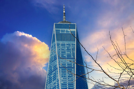 January 16, 2023 - New York, NY, USA: The Freedom Tower in New York City against a blue skyのeditorial素材