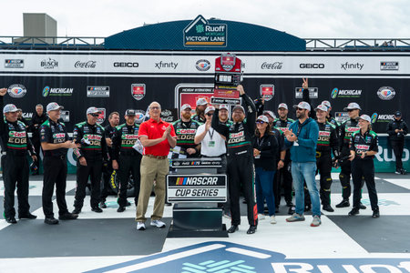 NASCAR Cup Series Driver, Chris Buescher (17) celebrates his win for the FireKeppers 400 at the Michigan International Speedway in Brooklyn MI.のeditorial素材