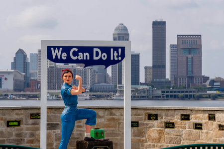 Aug 09, 2023-Clarksville, IN:  Statue of Rosie the Riveter on the banks of the Ohio River across from Louisville, Kentucky.のeditorial素材