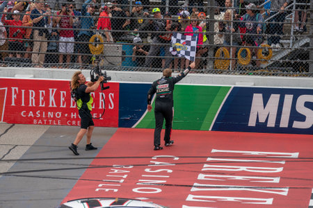 NASCAR Cup Series Driver, Chris Buescher (17) celebrates his win for the FireKeppers 400 at the Michigan International Speedway in Brooklyn MI.のeditorial素材