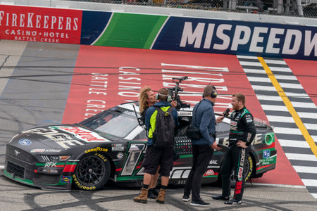 NASCAR Cup Series Driver, Chris Buescher (17) celebrates his win for the FireKeppers 400 at the Michigan International Speedway in Brooklyn MI.のeditorial素材