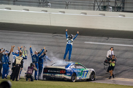 NASCAR Cup Driver, Chris Buescher (17) celebrates his win for the Coke Zero Sugar 400 at the Daytona...