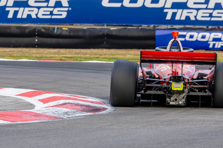 INDYCAR Series driver, BENJAMIN PEDERSEN (R) (55) of Copenhagen, Denmark, travels through the turns during a practice session for the Bitnile.com Grand Prix of Portland at Portland International Raceway in Portland OR.のeditorial素材