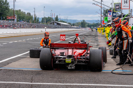INDYCAR Series driver, BENJAMIN PEDERSEN (R) (55) of Copenhagen, Denmark, brings his car in for service during the Bitnile.com Grand Prix of Portland at Portland International Raceway in Portland OR.のeditorial素材