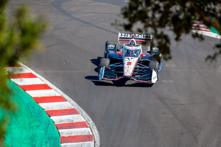 INDYCAR Series driver, JOSEF NEWGARDEN (2) of Nashville, Tennessee, travels through the turns during...
