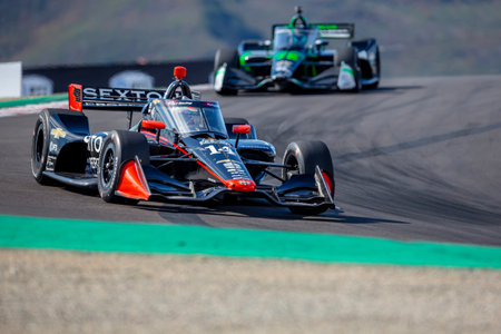INDYCAR Series driver, SANTINO FERRUCCI (14) of Woodbury, Connecticut, travels through the turns during a practice session for the Firestone Grand Prix of Monterey at WeatherTech Raceway Laguna Seca in Monterey CA.のeditorial素材