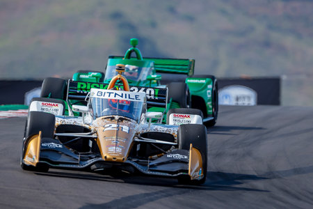 INDYCAR Series driver, RINUS VEEKAY (21) of Hoofddorp, Netherlands, travels through the turns during a practice session for the Firestone Grand Prix of Monterey at WeatherTech Raceway Laguna Seca in Monterey CA.のeditorial素材