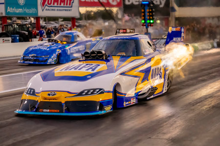 Sep 22, 2023-Concord, NC:  NHRA Funny Car Series driver, Ron Capps, runs down the lane during a qualifying session for the Betway Carolina Nationals.のeditorial素材