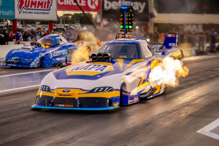 Sep 22, 2023-Concord, NC:  NHRA Funny Car Series driver, Ron Capps, runs down the lane during a qualifying session for the Betway Carolina Nationals.のeditorial素材