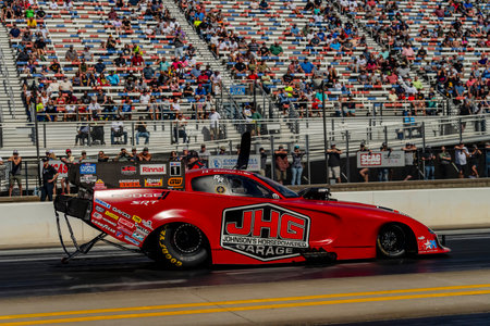 Sep 24, 2023 - Concord, NC:  NHRA Funny Car Series driver, Matt Hagan, makes a run during the Betway Carolina Nationals.のeditorial素材