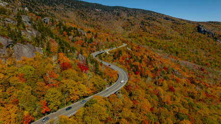 Aerial view of beautiful rock formations along the North Carolina mountains as the leaves start to change during the first part of fall.の写真素材